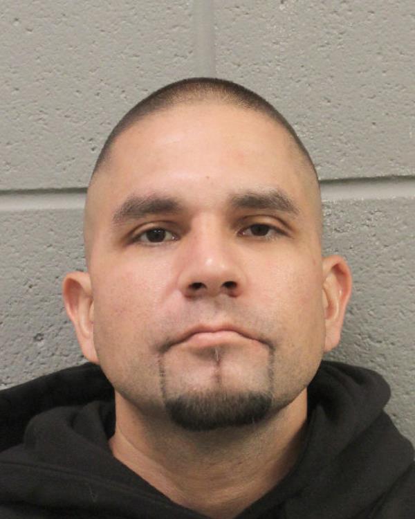As one of the alleged perps, identified as Michael Perez, was being arrested, the second suspect emerged from a bedroom and shot at police.